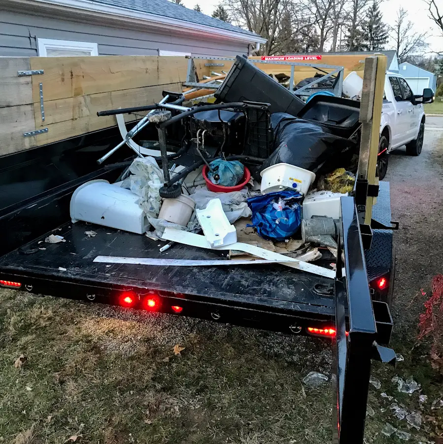Roll-off dumpster delivered to a residential driveway in Dundee
