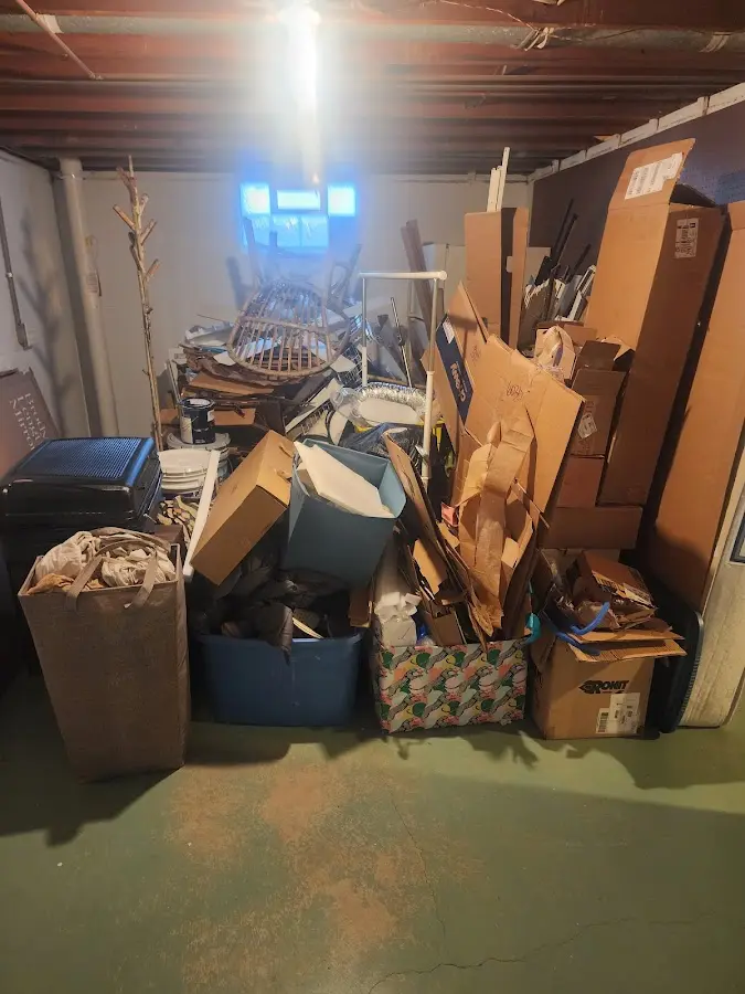 Roll-off dumpster container at job site for 15 Yard Dumpster Rental in Dundee